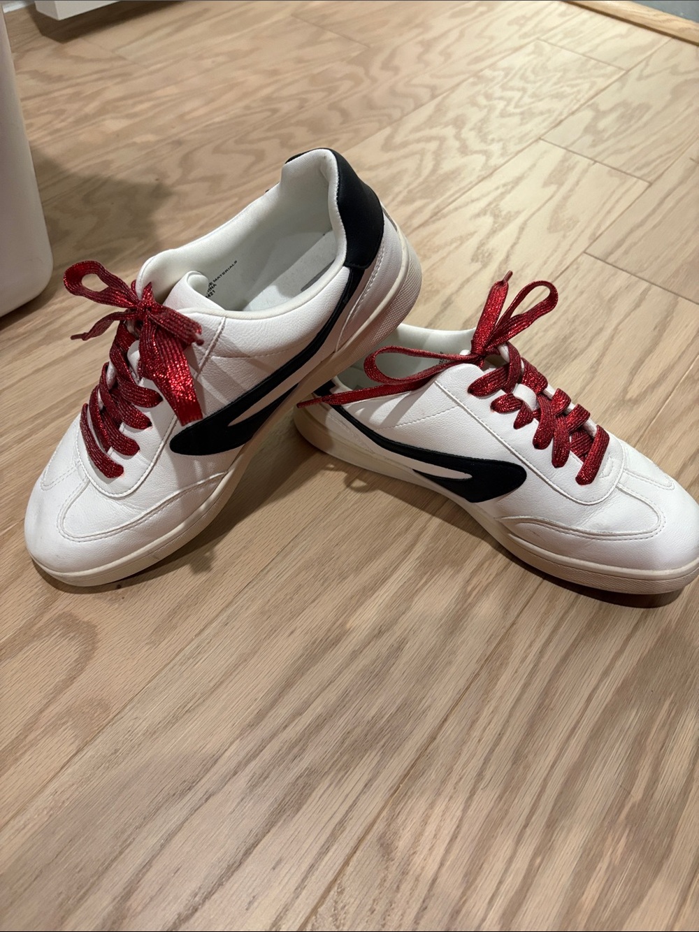 Dolce Vita Women’s White Sneakers with Black Swoosh and Red Laces